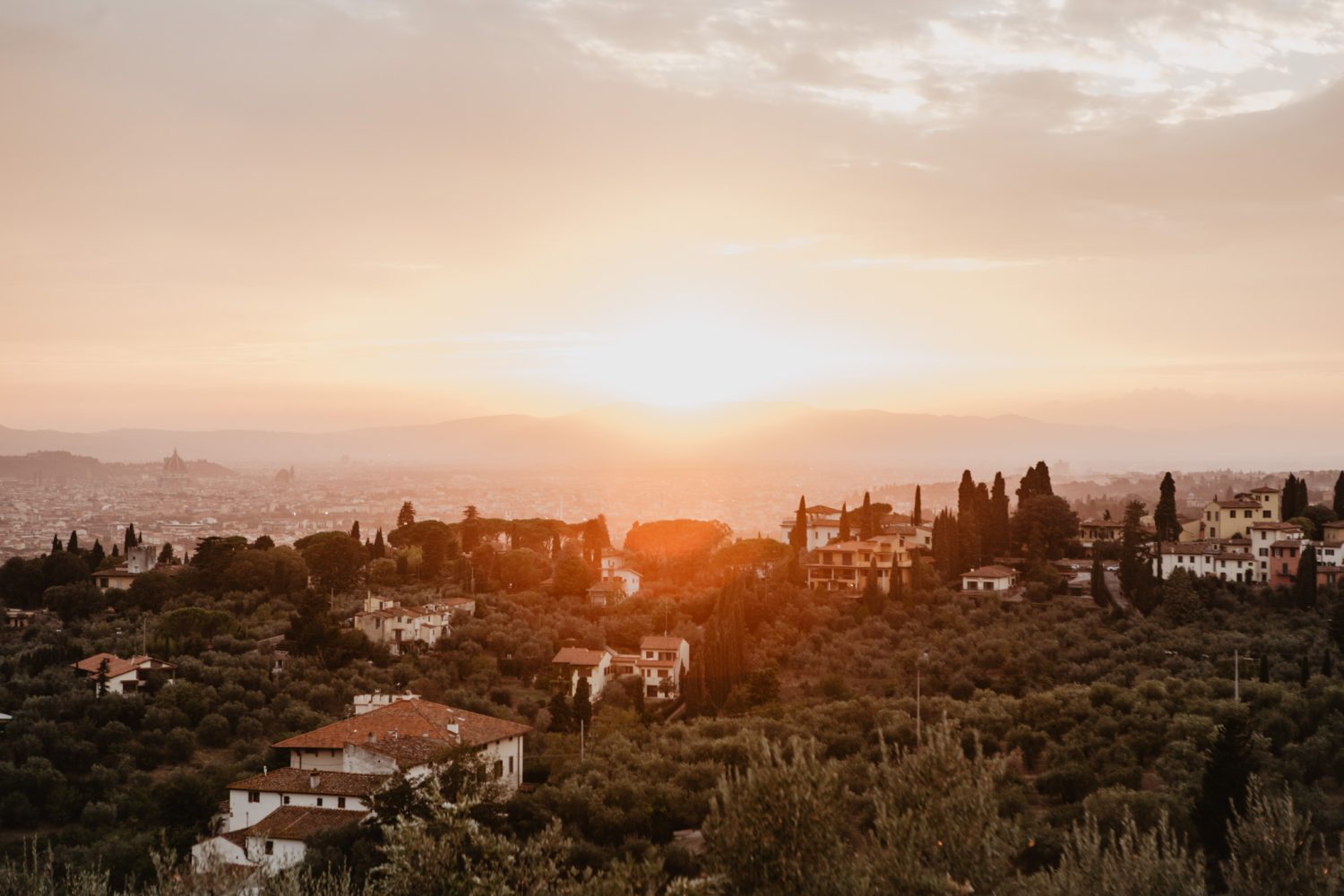 sunset over tuscany at italy villa wedding