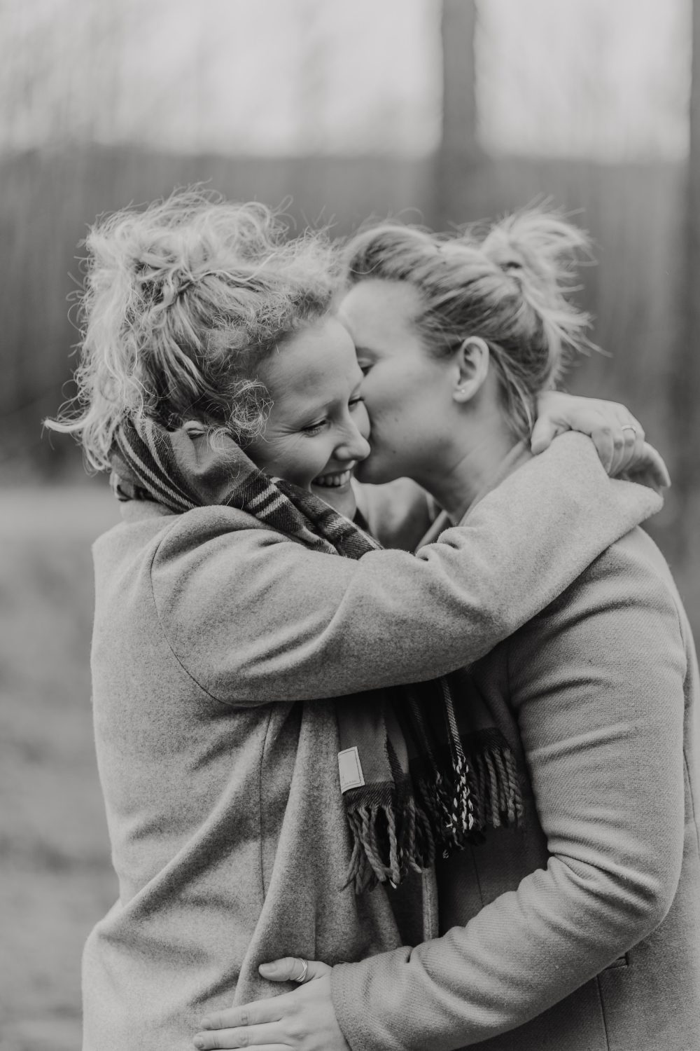 black and white photo of couple posing together for their kent couple shoot