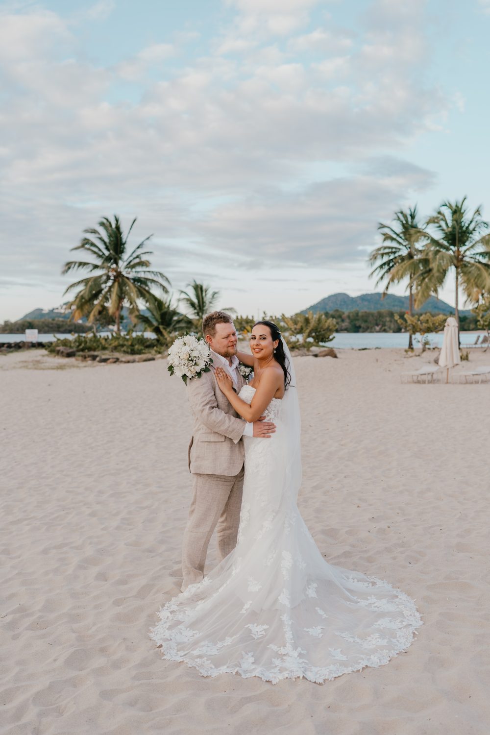 bride and groom on the beach in saint lucia at stolentime by rendezvous wedding venue