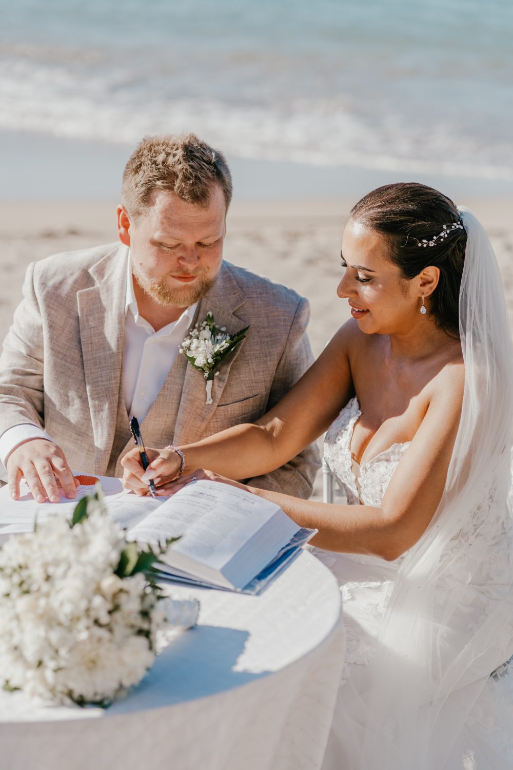 bride and groom marry on the beach in saint lucia at stolentime by rendezvous wedding venue