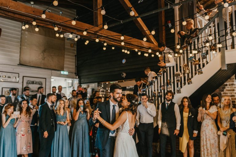 bride and groom first dance at east quay wedding venue in whitstable