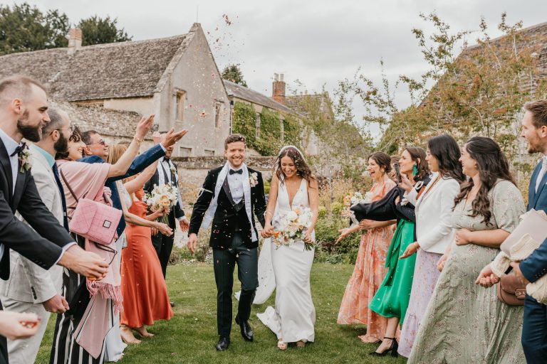 confetti toss with bride and groom at Caswell House in Oxford