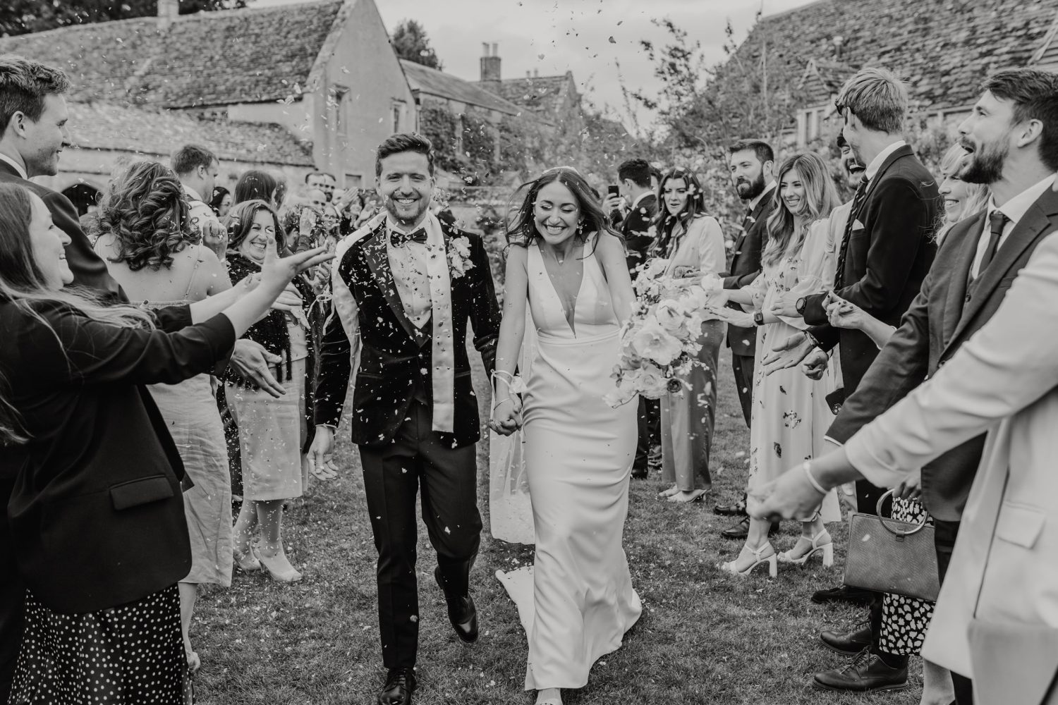 black and white confetti shot at Caswell House wedding venue in Oxfordshire