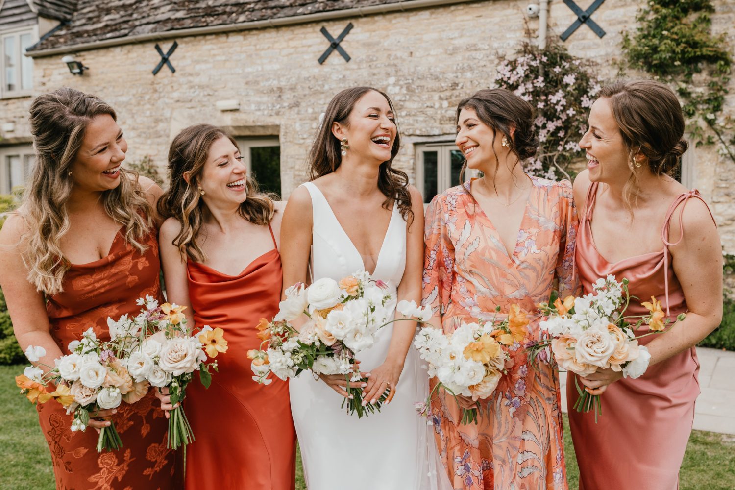 bridal party natural laughter portraits at Caswell House wedding venue