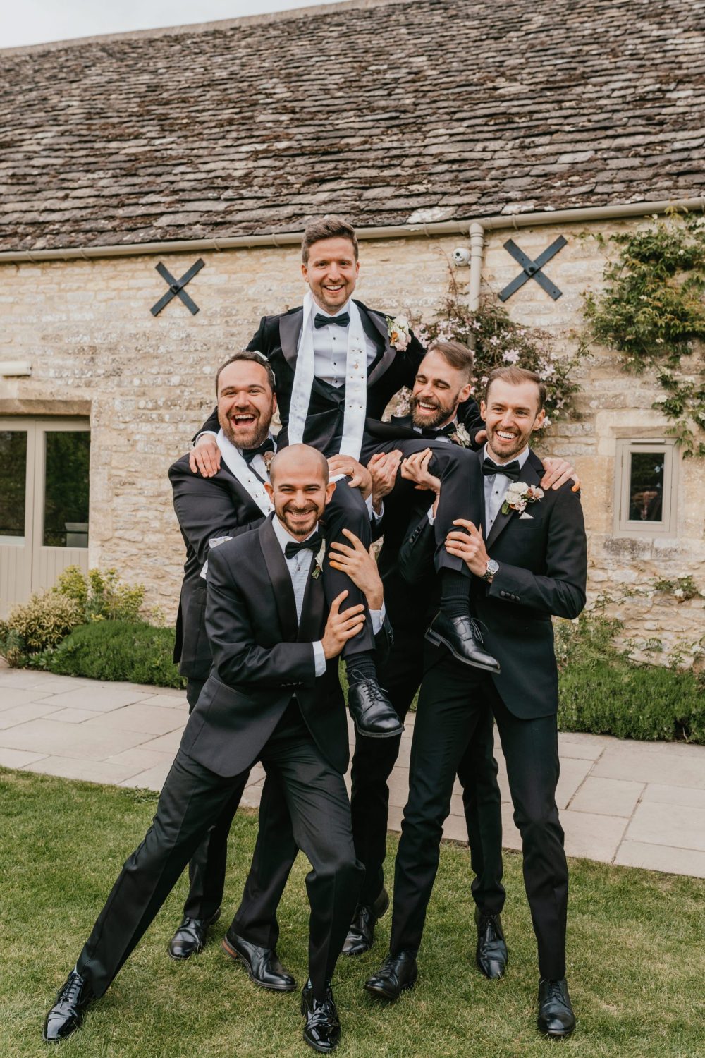 groom and groomsmen fun portraits