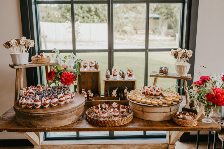 dessert table in the baby barn at botley hill barn wedding venue in surrey