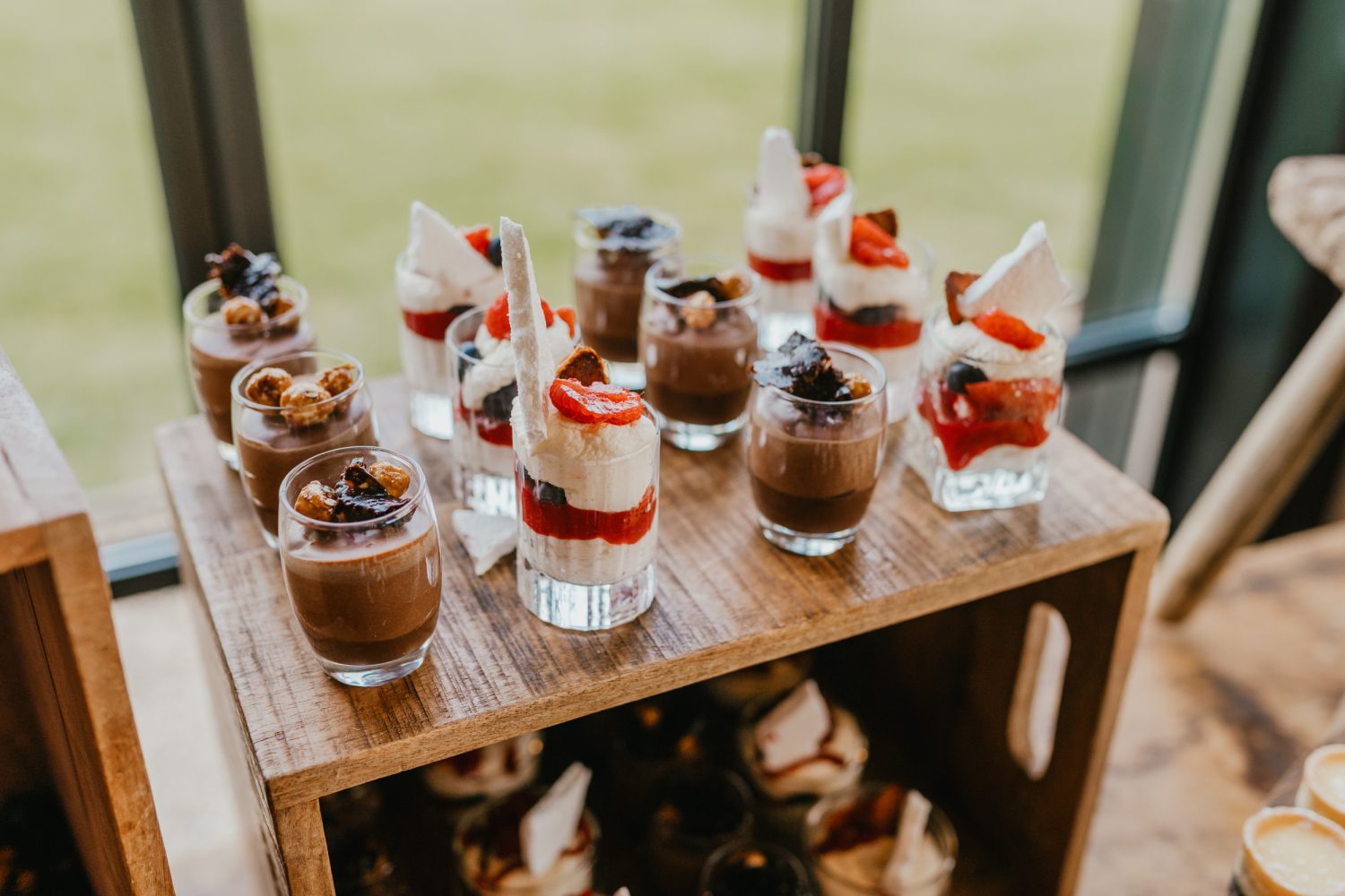 dessert table in the baby barn at botley hill barn wedding venue in surrey