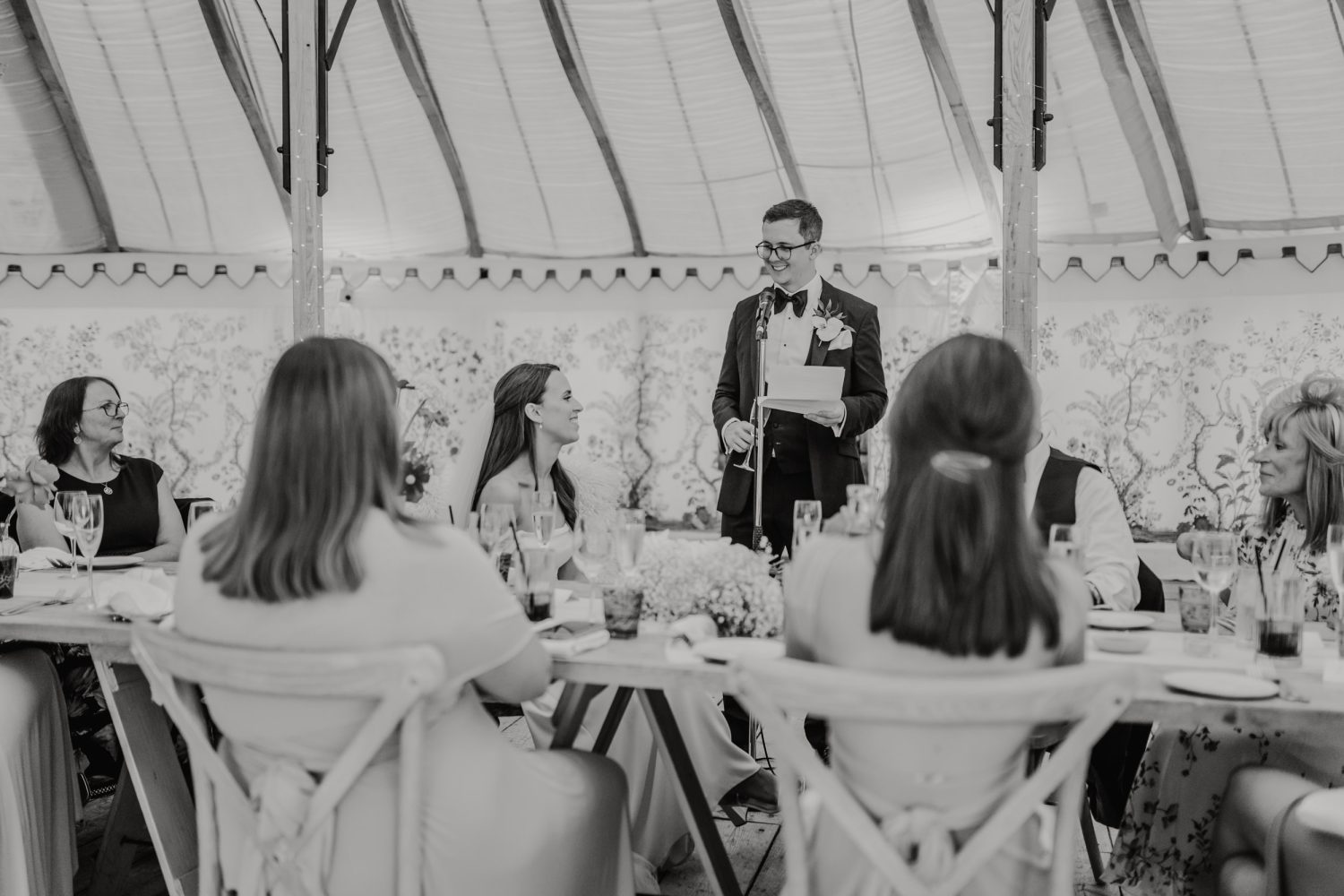 black and white photo of groom's speech in the grand pavilion at the beacon wedding