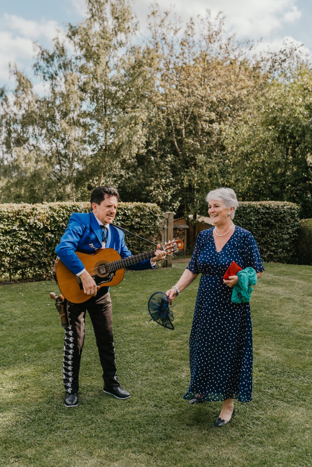 guest dancing whilst mariachi band plays at the beacon wedding in kent