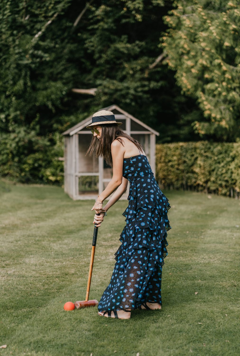 wedding guests playing croquet on the lawn at the beacon tunbridge wells