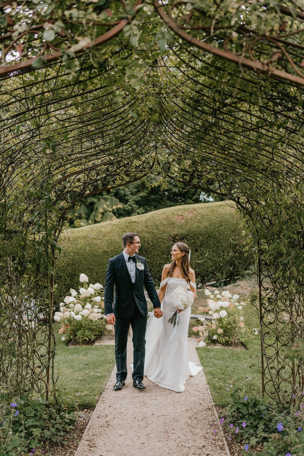 bride and groom couple portraits in the gardens at the beacon wedding venue in tunbridge wells