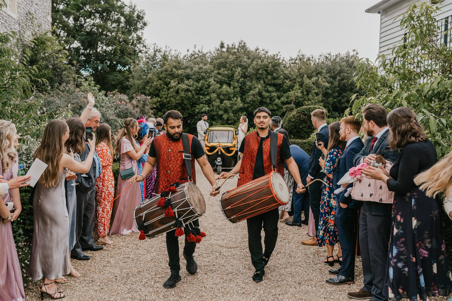 dhol drummer entrance with bride and groom on tuktuk at chapel house estate in ramsgate