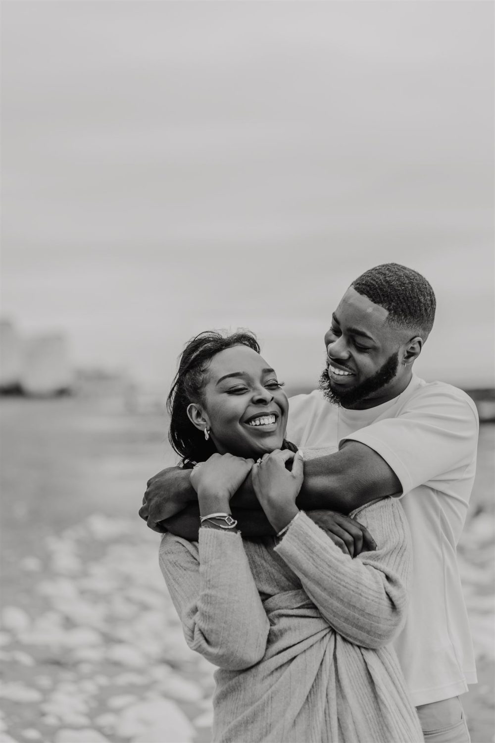 black and white photo of couple at botany bay beach