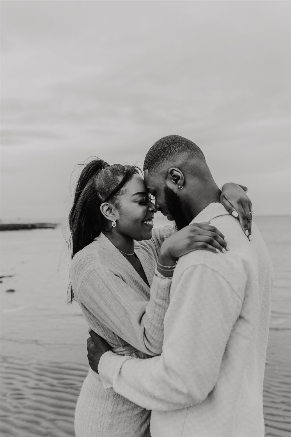 black and white photo of couple at botany bay beach