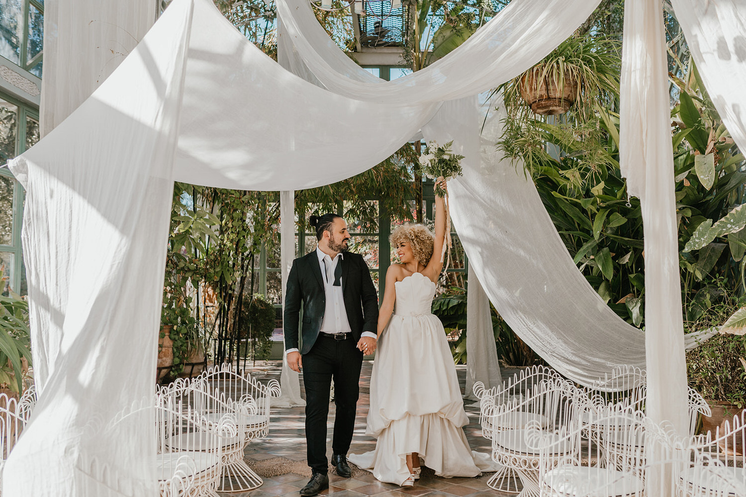 bride and groom celebrate wedding at beldi country club in marrakech