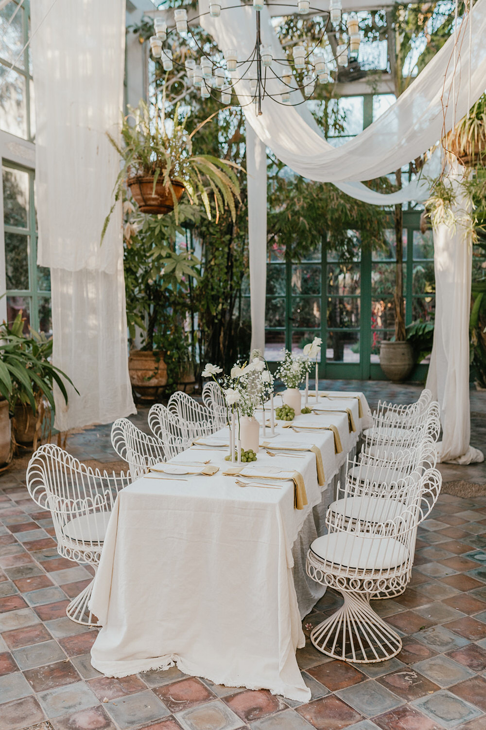 intimate wedding breakfast setup in the glasshouse at beldi country club marrakech