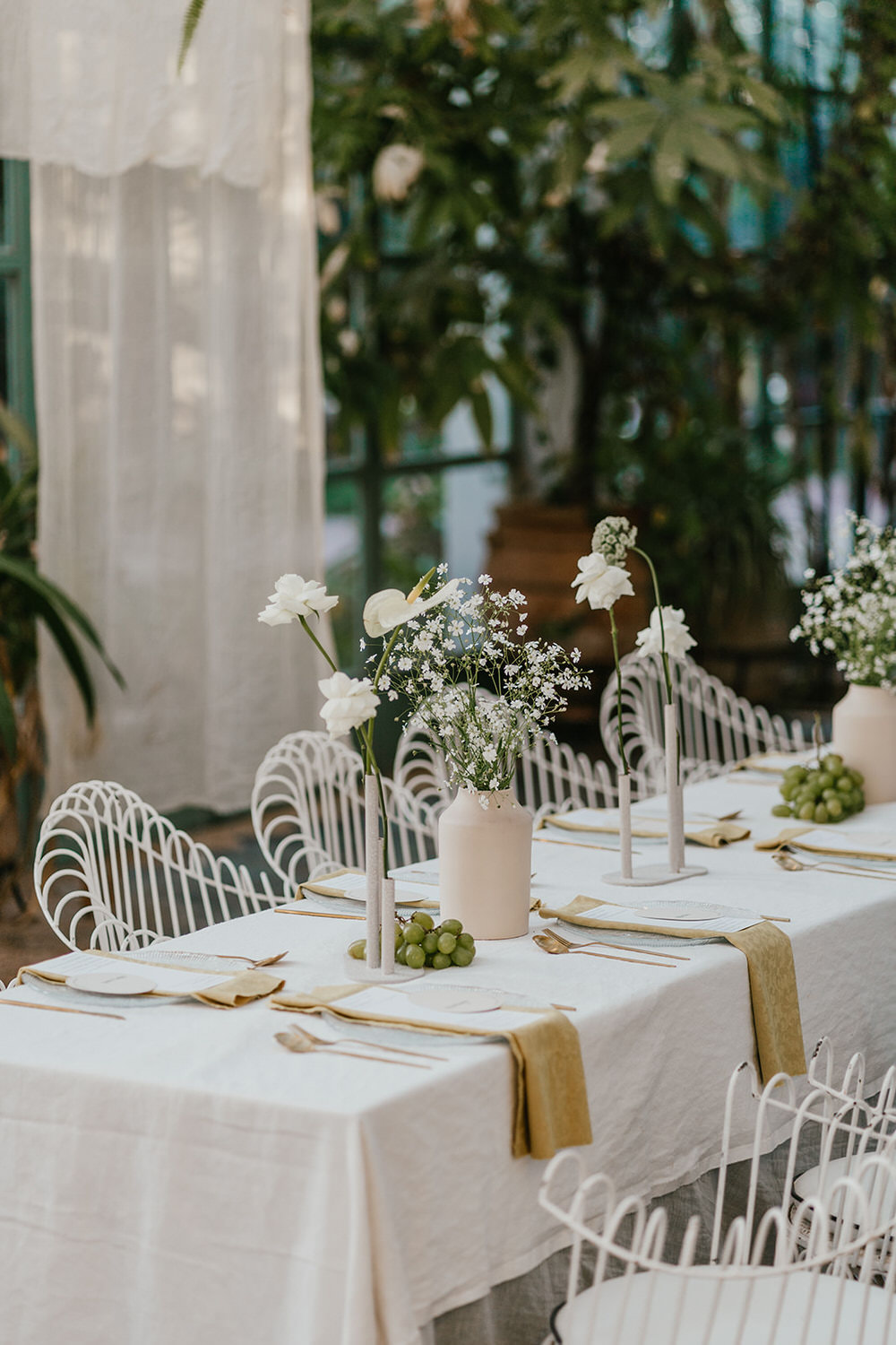 intimate wedding breakfast setup in the glasshouse at beldi country club marrakech