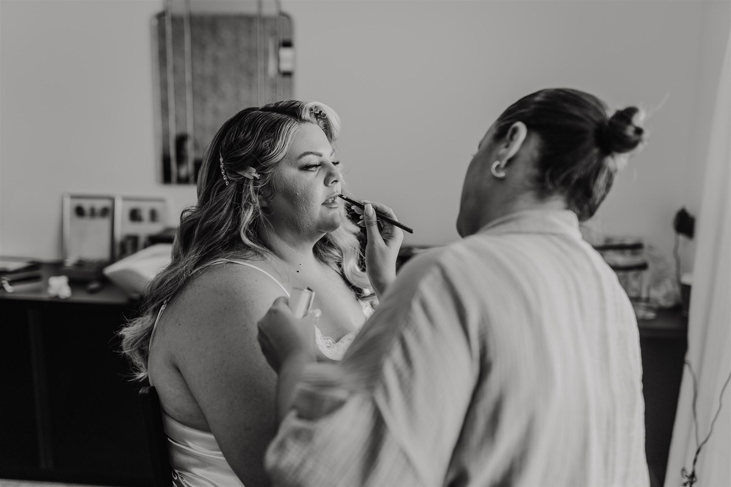 black and white photo of bridal prep at chapel house estate wedding in kent