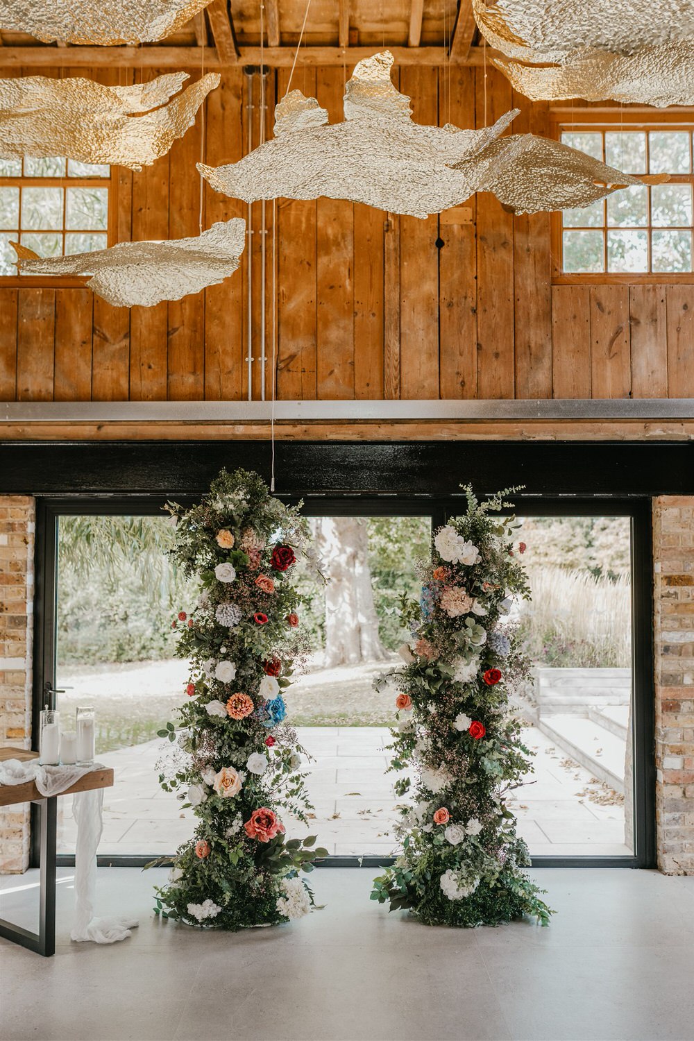 indoor ceremony setup at chapel house estate wedding venue in kent