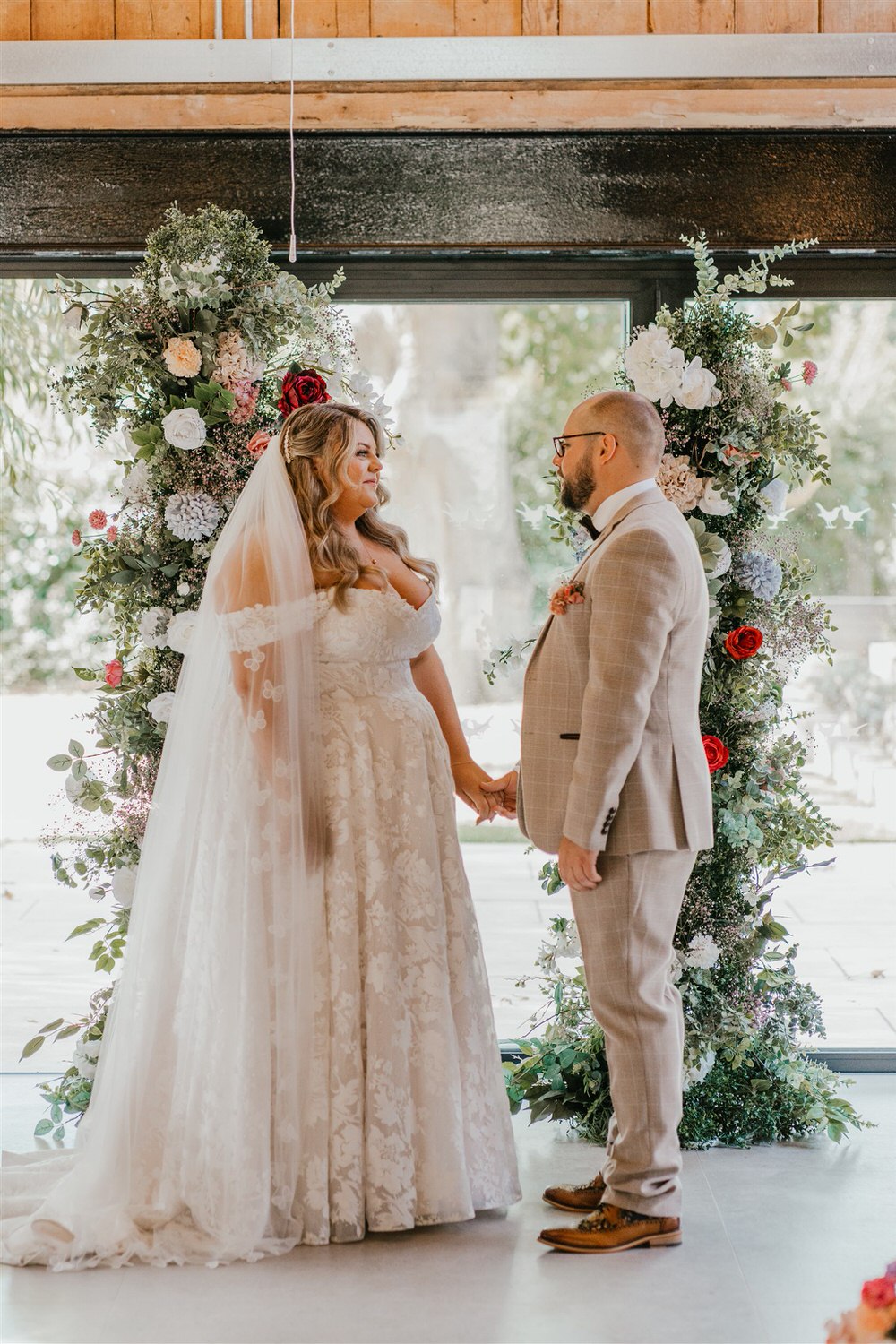 indoor wedding ceremony at chapel house estate wedding in kent