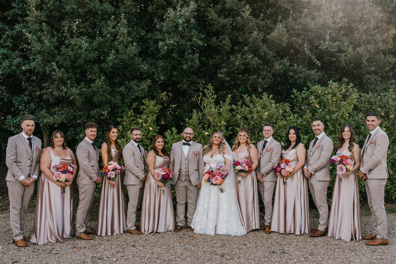 group photo of bridesmaids and groomsmen at chapel house estate wedding