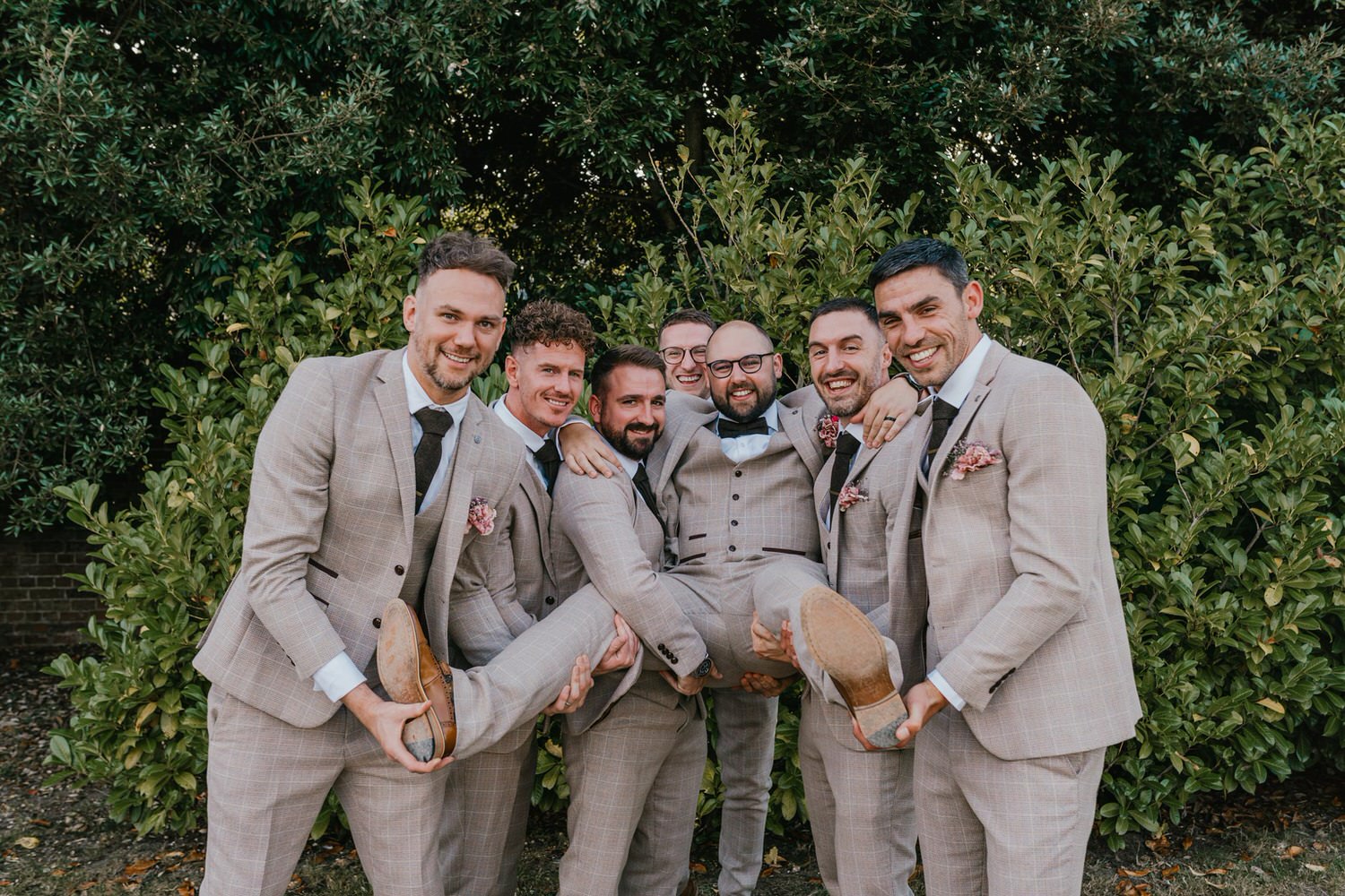fun group photo of groomsmen at chapel house estate wedding