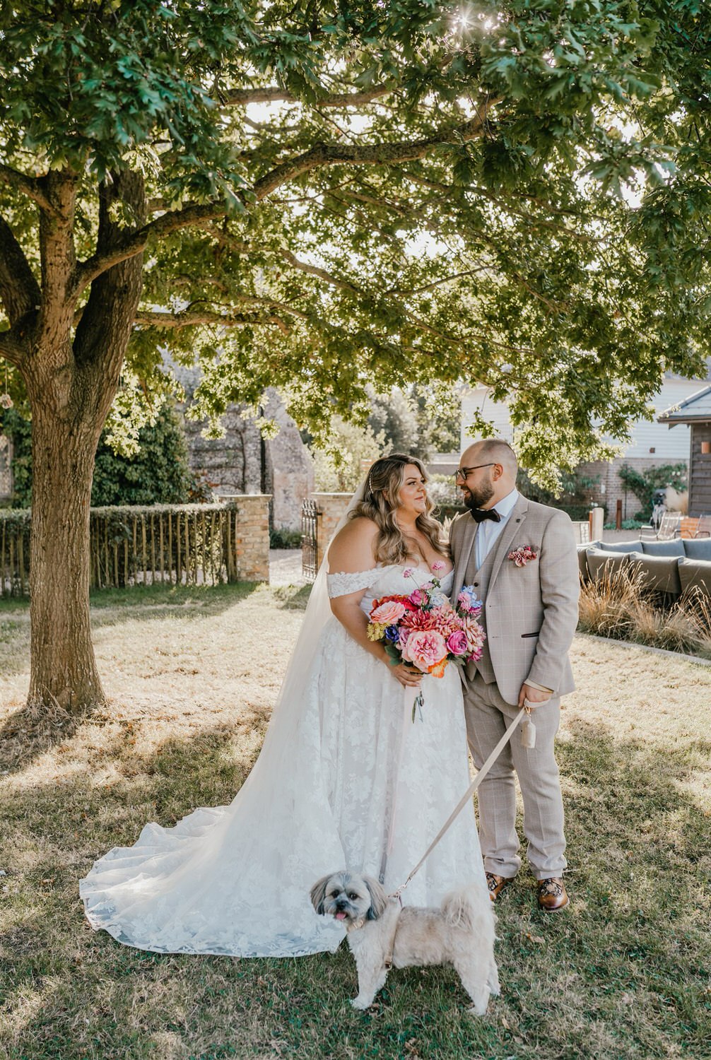 bride and groom couple portraits with dog at chapel house estate in kent