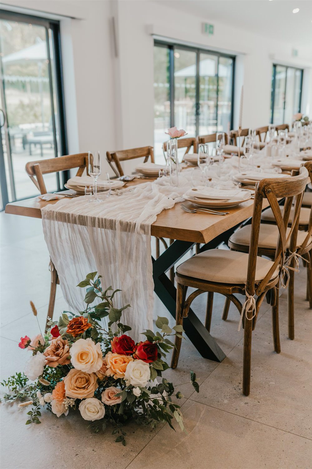 wedding breakfast setup with long tables at chapel house estate wedding