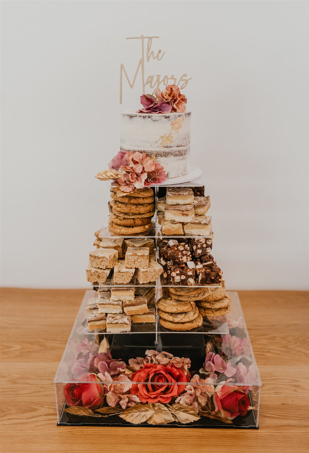 unique wedding cake idea with favourite desserts at chapel house estate wedding