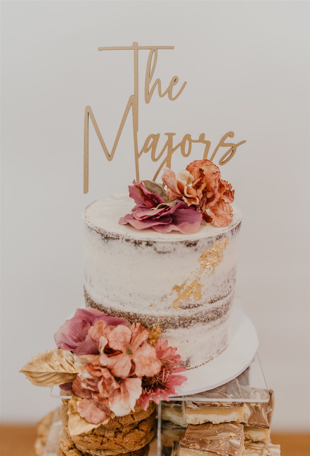unique wedding cake idea with favourite desserts at chapel house estate wedding