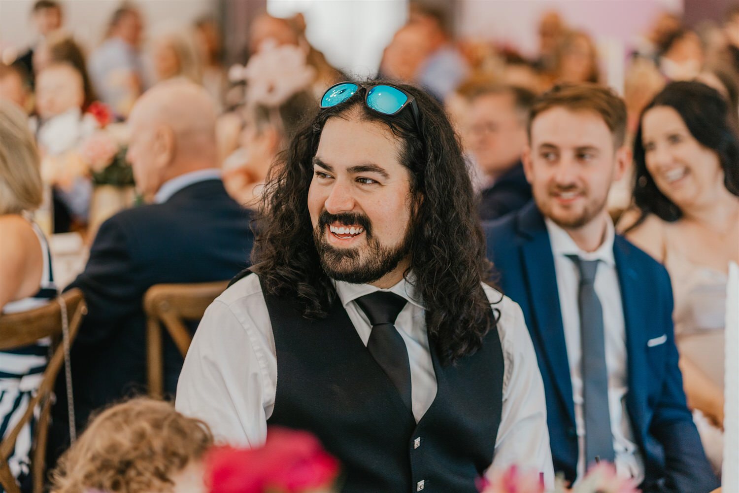 guest laughing during wedding speeches at chapel house estate wedding