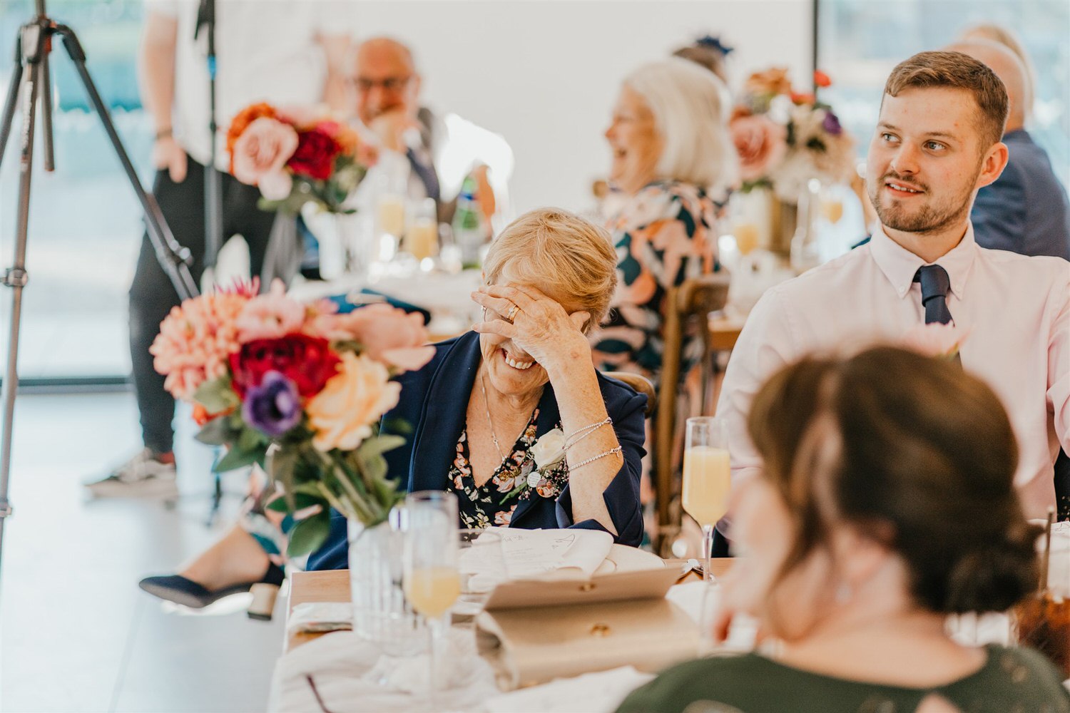 guest laughing during wedding speeches at chapel house estate wedding