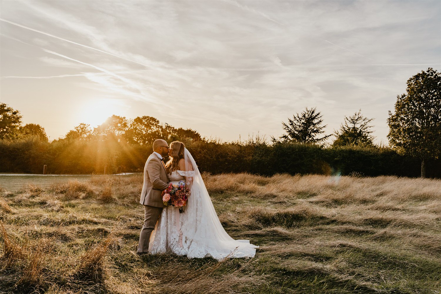 bride and groom sunset couple portraits at chapel house estate in kent