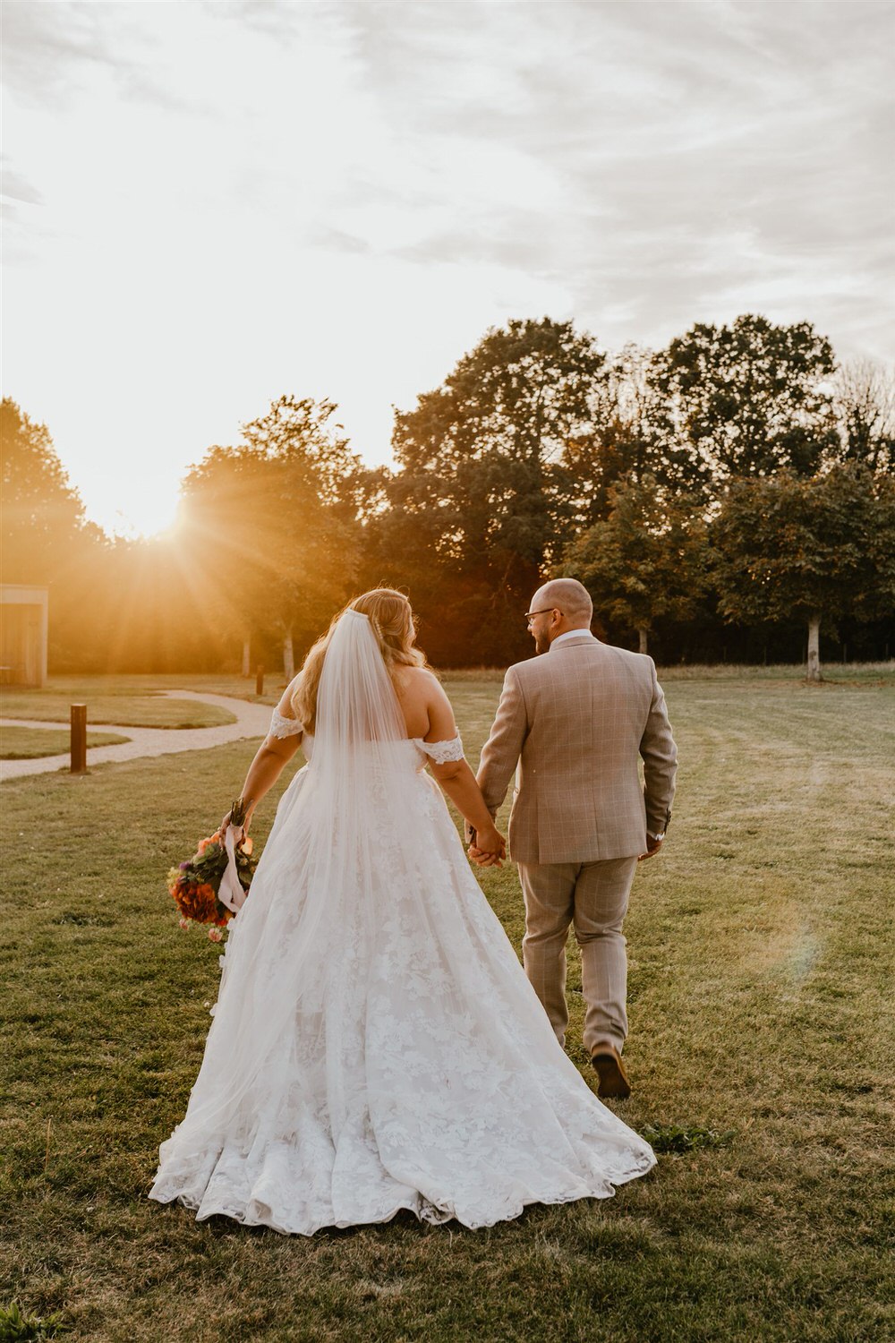 bride and groom sunset couple portraits at chapel house estate in kent