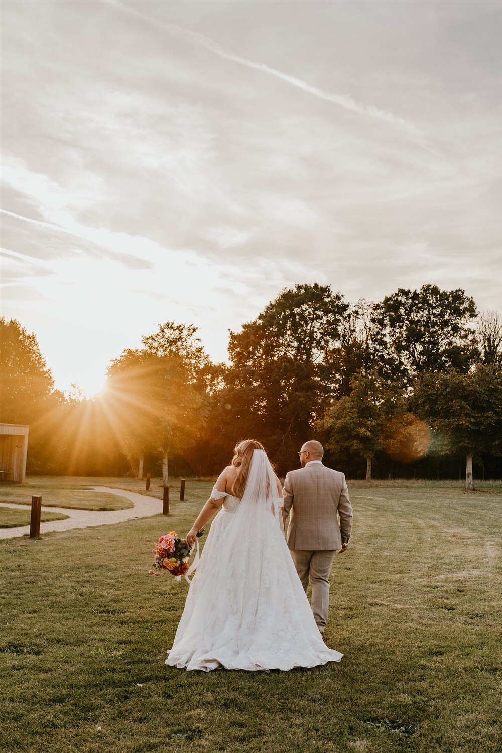 bride and groom sunset couple portraits at chapel house estate in kent