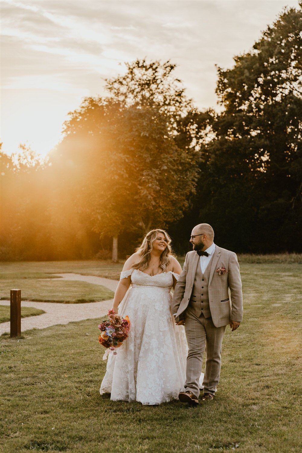 bride and groom sunset couple portraits at chapel house estate in kent