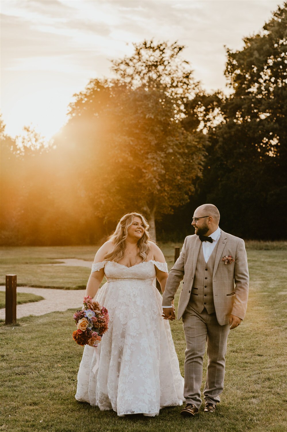 bride and groom sunset couple portraits at chapel house estate in kent