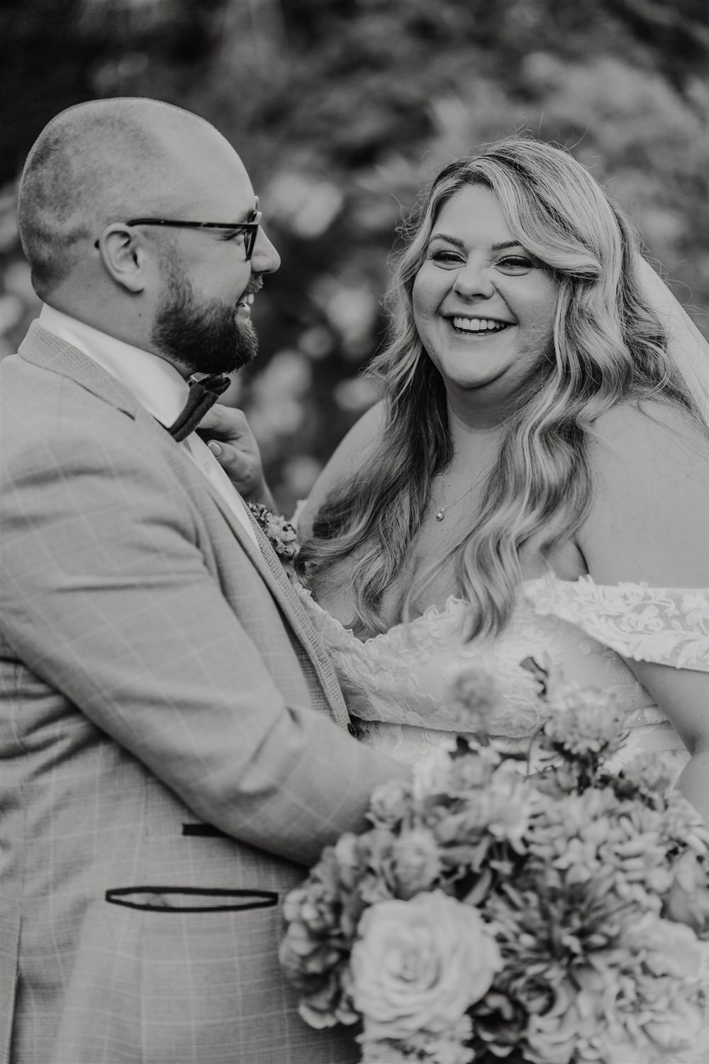 black and white bride and groom couple portraits in the gardens at chapel house estate