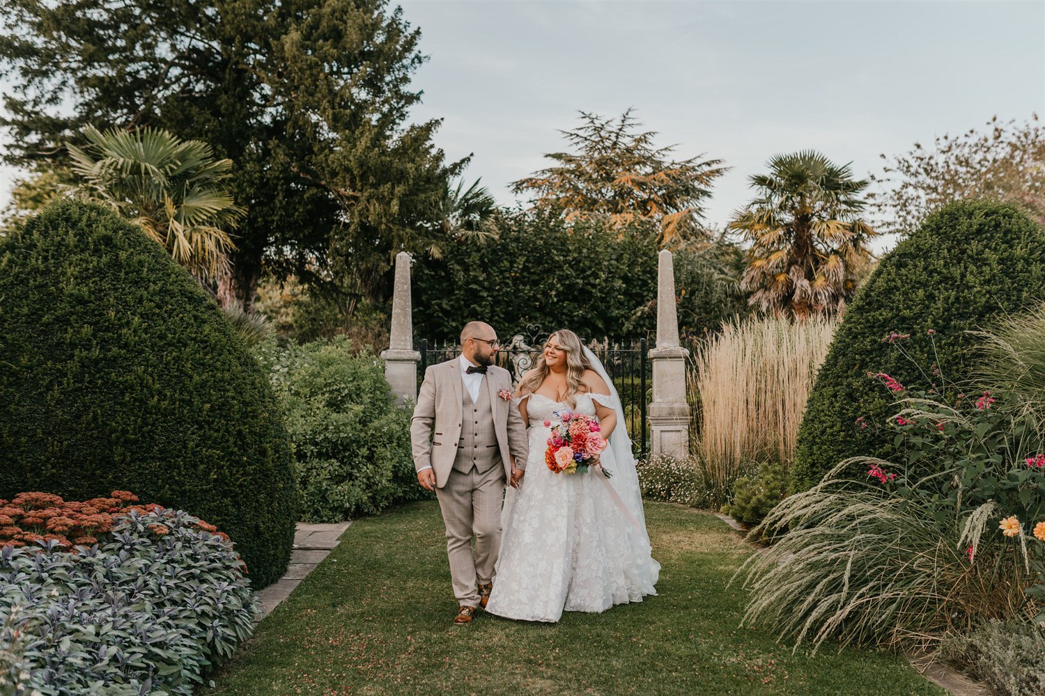 bride and groom couple portraits in the gardens at chapel house estate