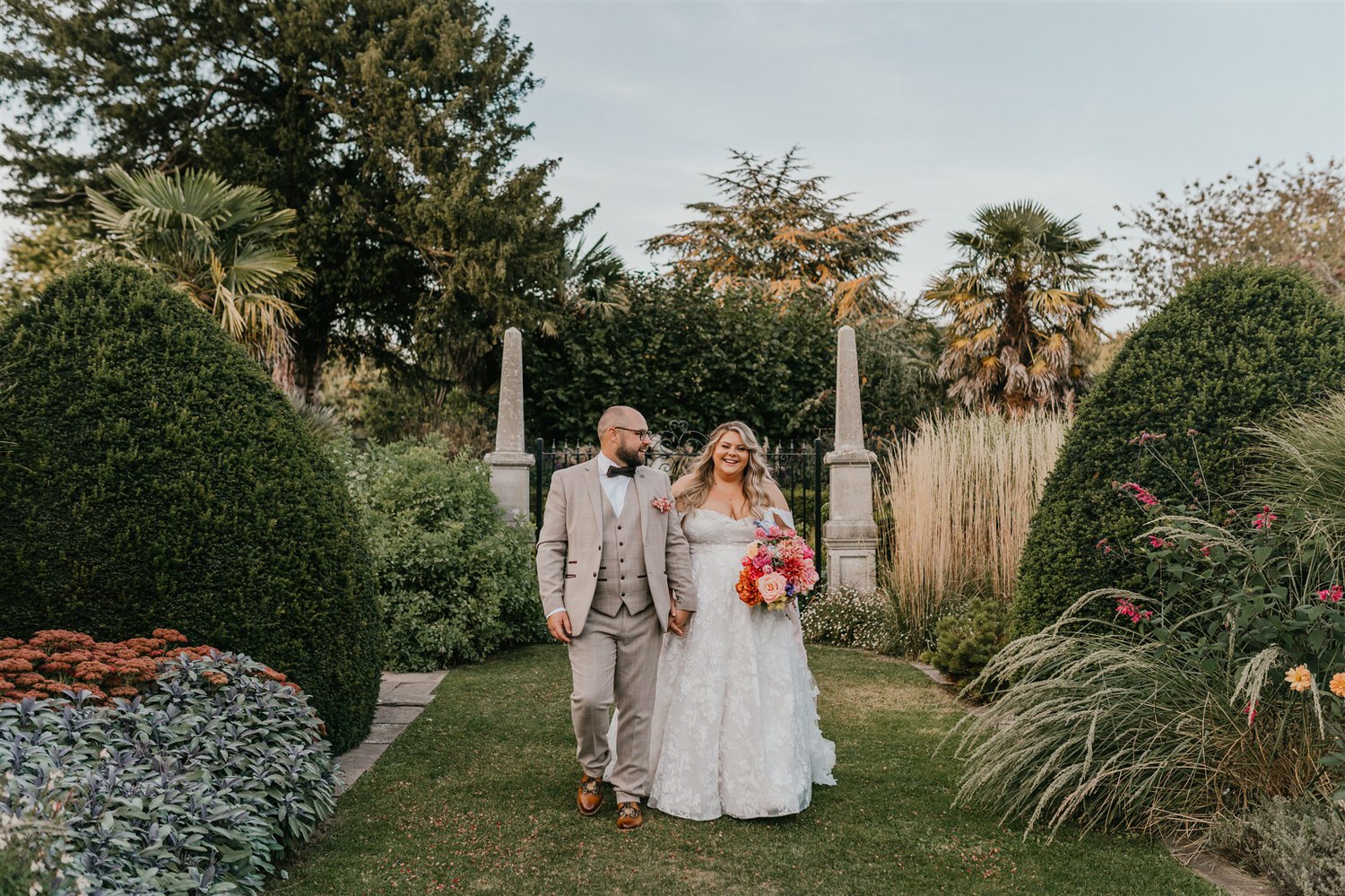 bride and groom couple portraits in the gardens at chapel house estate
