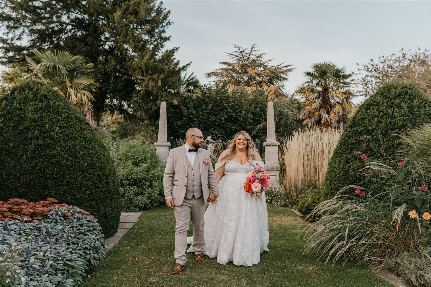 bride and groom couple portraits in the gardens at chapel house estate
