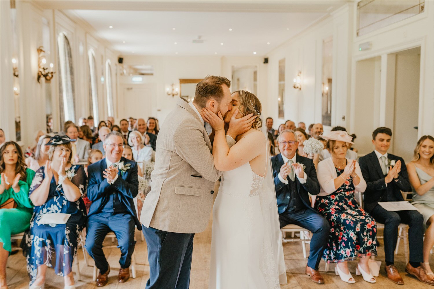 bride and groom first kiss at hotel du vin tunbridge wells wedding ceremony