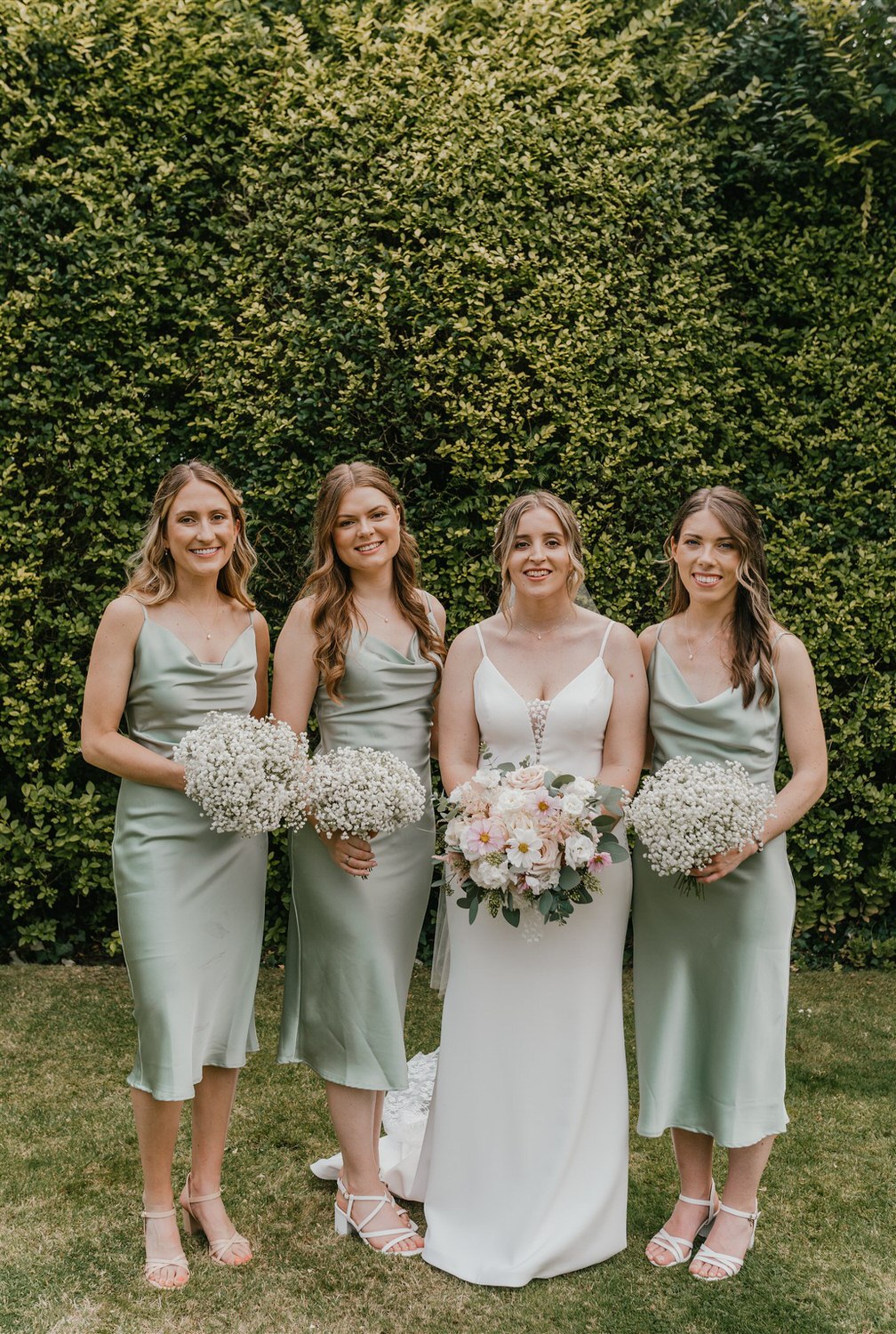 bridal party portraits in the gardens at hotel du vin tunbridge wells wedding