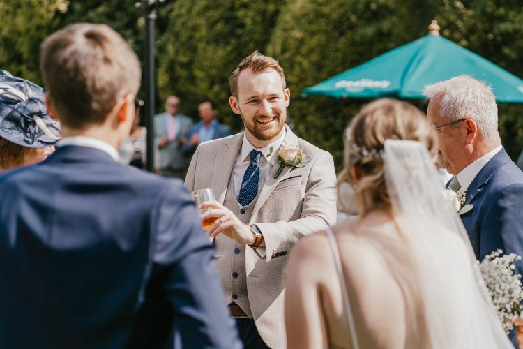 candid portraits during drinks reception in the gardens at hotel du vin tunbridge wells wedding