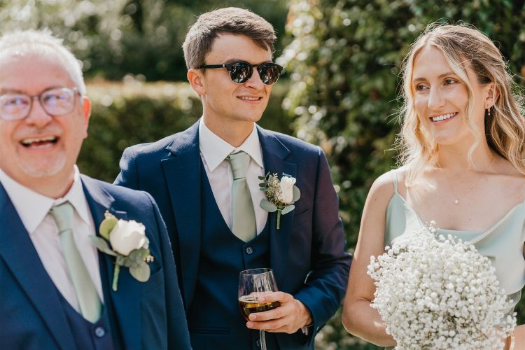 candid guest portraits during drinks reception in the gardens at hotel du vin tunbridge wells wedding