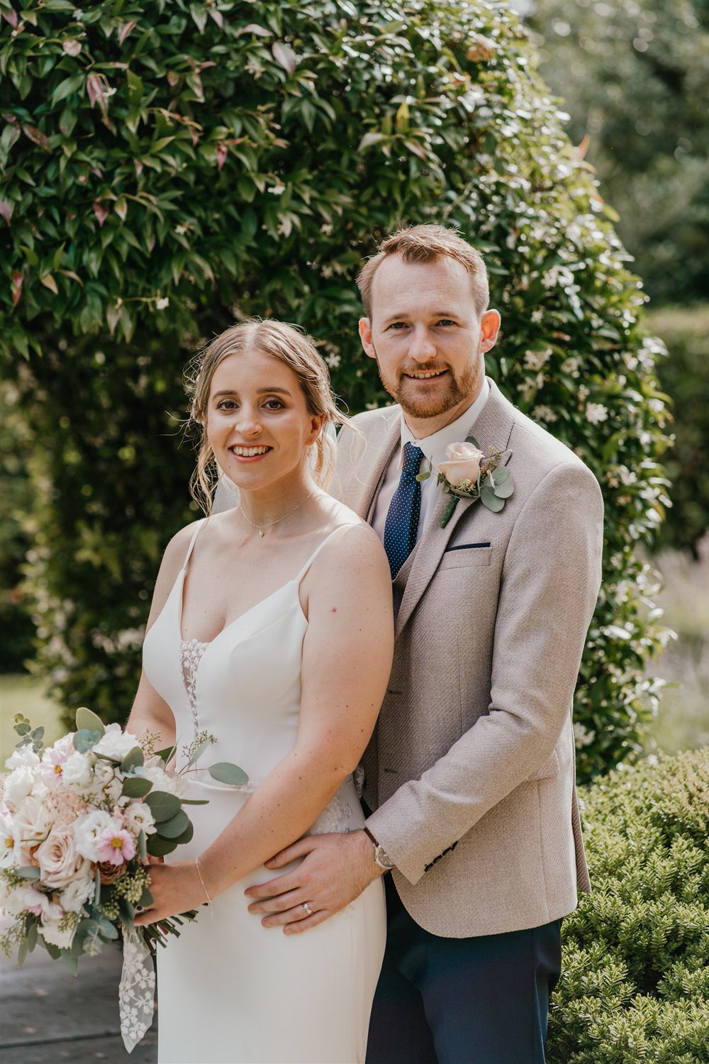 bride and groom couple portraits in the gardens at hotel du vin wedding in tunbridge wells