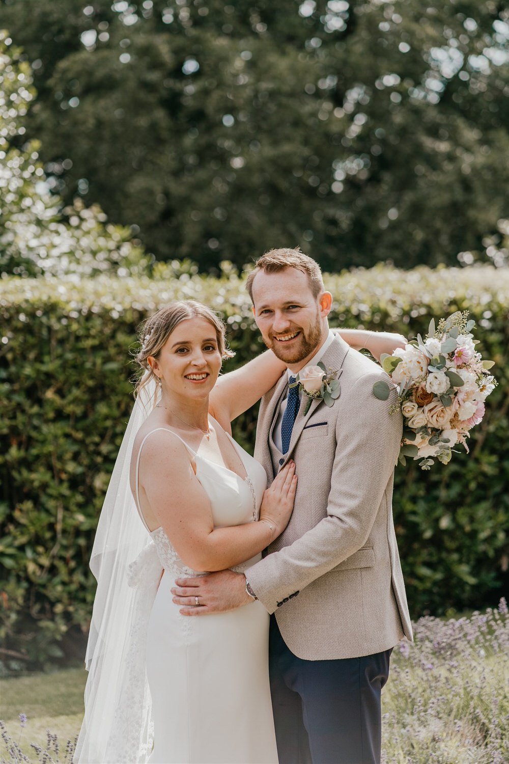 bride and groom couple portraits in the gardens at hotel du vin wedding in tunbridge wells