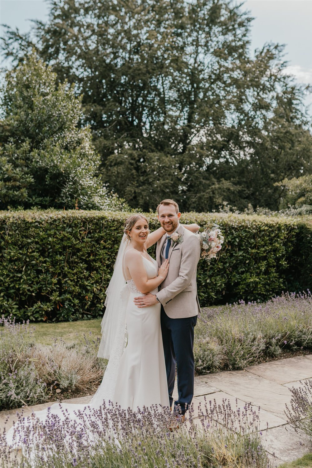bride and groom couple portraits in the gardens at hotel du vin wedding in tunbridge wells