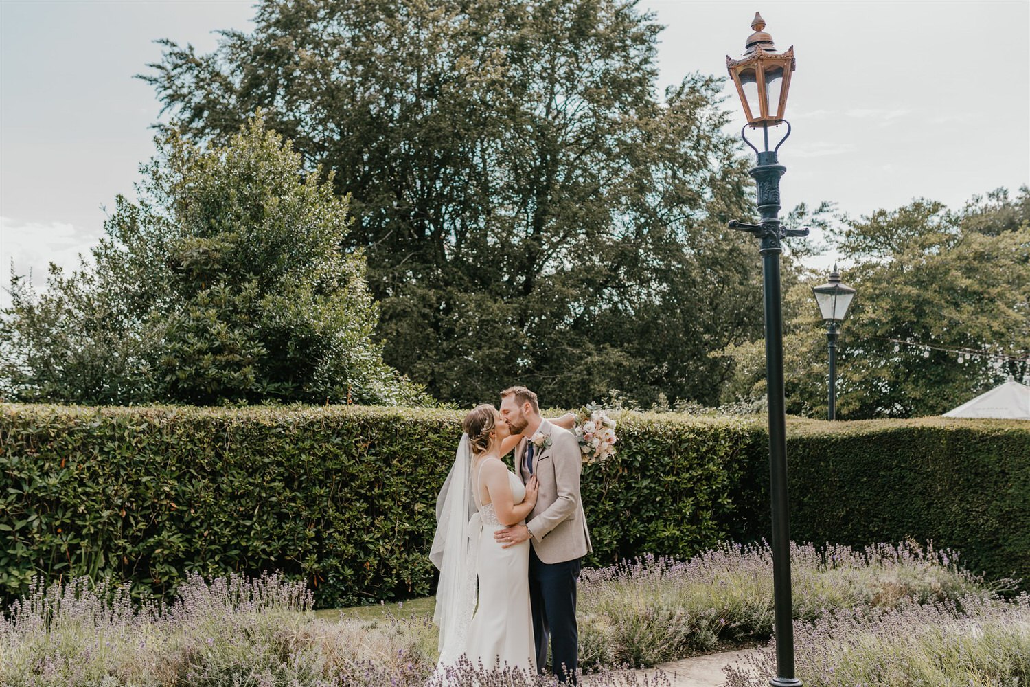 bride and groom couple portraits in the gardens at hotel du vin wedding in tunbridge wells