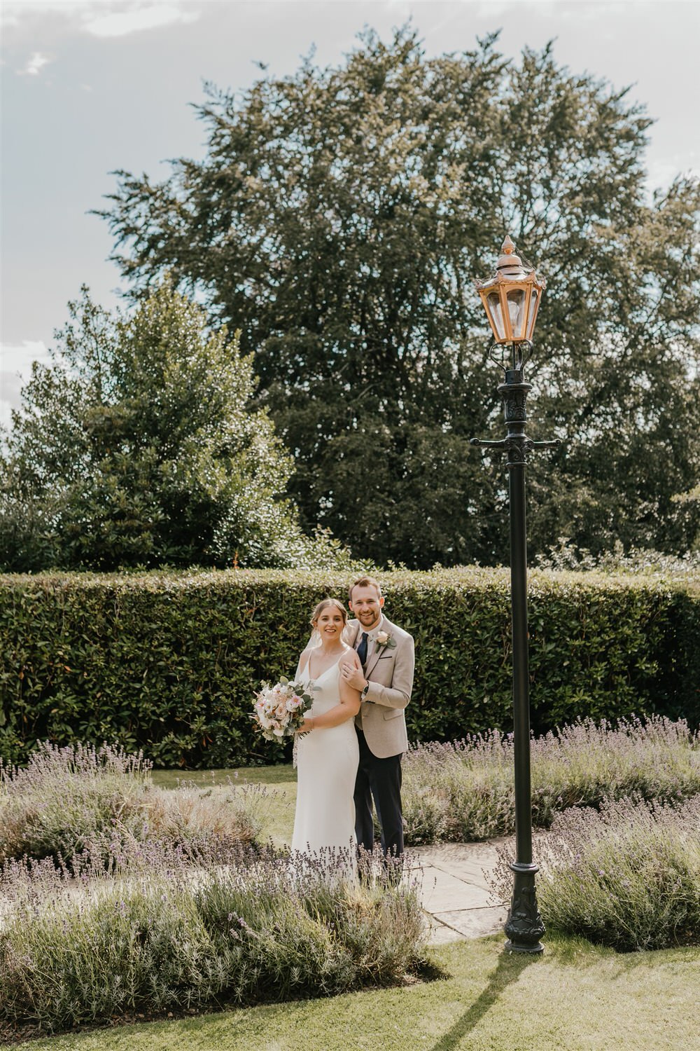 bride and groom couple portraits in the gardens at hotel du vin wedding in tunbridge wells
